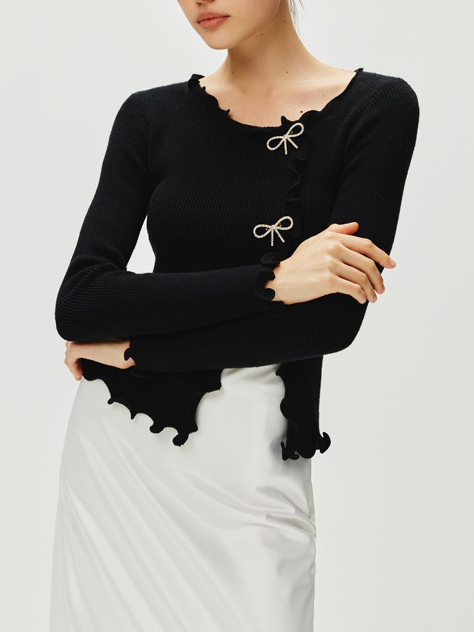 Pullover mit Strass-Schleife und gewelltem Saum