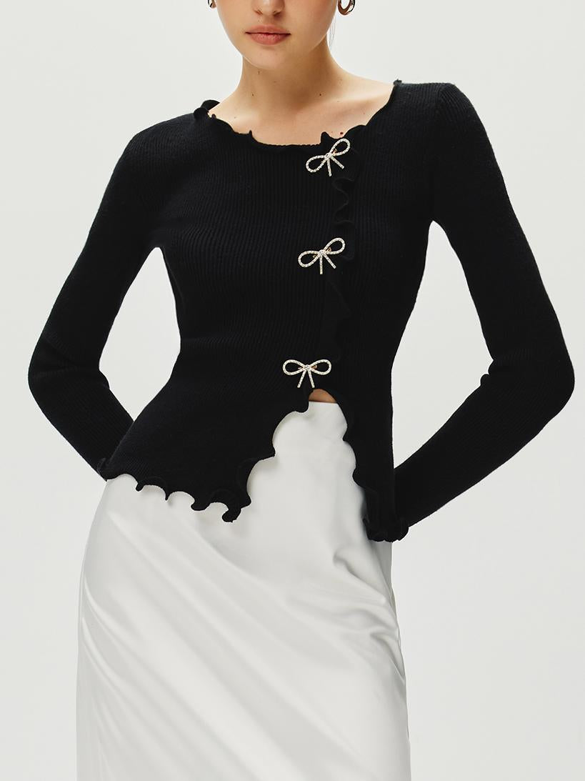 Pullover mit Strass-Schleife und gewelltem Saum